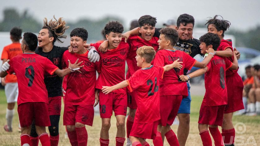 A team cheers after winning a championship game on Sunday, July 10, 2022.